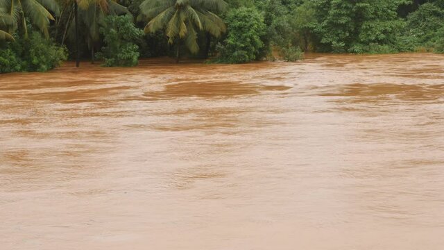 Shot of river water flowing over danger level