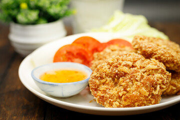 Shrimp Cakes, Fried Shrimps, Thai food, name: Tod Man Goong, concept of deep fried Thai food.