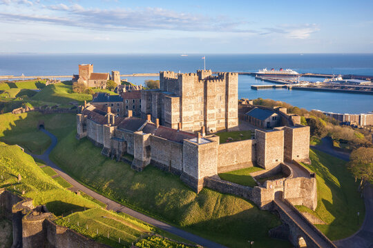Dover, England, United Kingdom - May 10, 2021: View of Dover castle and harbour at sunset.