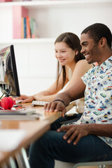 People working on computer in office