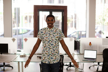 Man smiling in office