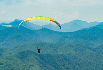paraglider over the mountains
