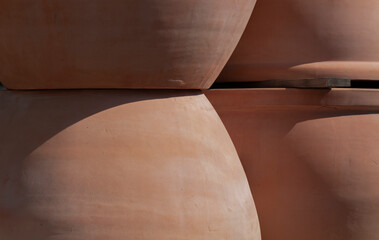 Closeup of pottery plant pots under sunlight