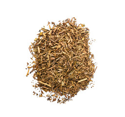 Pile of dry hojicha green tea on white background