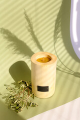 Wooden candle holder rustic interior centerpiece with candles in a cozy barn setting.