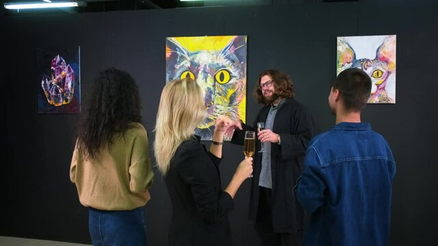 contemporary artist is presenting new artworks for visitors of gallery and friends