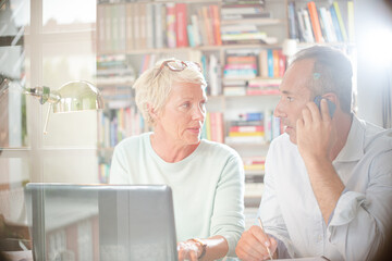 Business people working together at home office desk