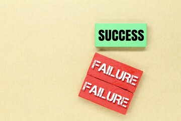 colored boards with the words success and failure. the concept of success
