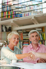 Business people shaking hands in meeting