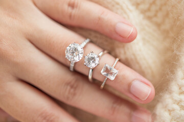 Female hand with beautiful jewelry diamond ring - Powered by Adobe