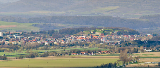 Panorama of the town of Klodzko with the Bardzkie Mountains in the background, view from a nearby hill.