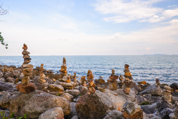 Stone stacked on rock beach at Laem Hua Mong - Kho Kwang Viewpoint in Chomphon province Thailand