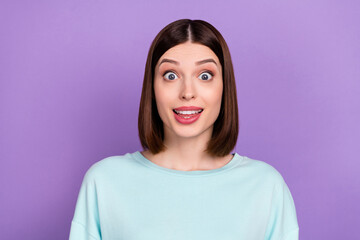 Fototapeta premium Photo portrait amazed staring girl wearing blue sweatshirt isolated pastel violet color background