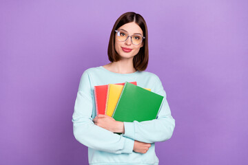 Photo portrait girl keeping book preparing to test wearing glasses isolated pastel purple color background