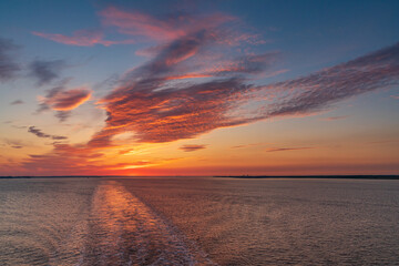 Sunset and evening clouds over the River Humber near Sunk Island, East Riding of Yorkshire, England, UK