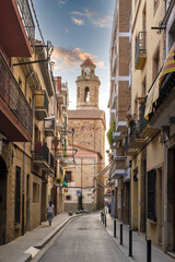 Naklejka na ściany i meble Saint Mary and Saint Nicholas church in Calella de Mar, Catalonia. Mediterranean city scape in Spain.