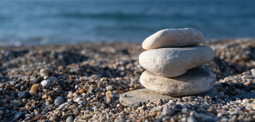 Pebbles stacked evenly on the beach