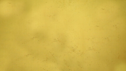 Aged yellow background with black dots and roughness