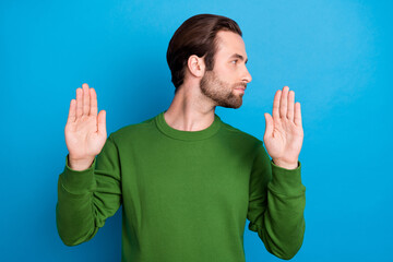 Photo of young serious male look copyspace show stop gesture protest corruption restriction...