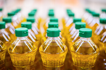 vegetable oil in bottle pattern factory warehouse store food background - Powered by Adobe