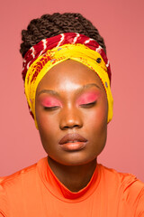 Studio portrait of stylish woman in turban
