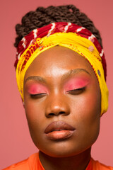 Close-up of stylish young woman wearing turban