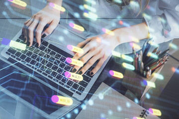 Double exposure of woman hands working on computer and data theme hologram drawing. Tech concept.