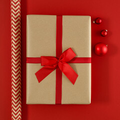 Chrsitmas brown gifts on red background and free space for your decoration 