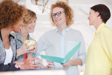 Fototapeta premium Portrait of female colleagues smiling in office