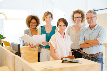 Group portrait of smiling office workers