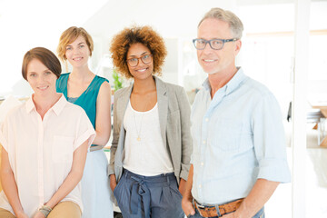 Group portrait of smiling office workers