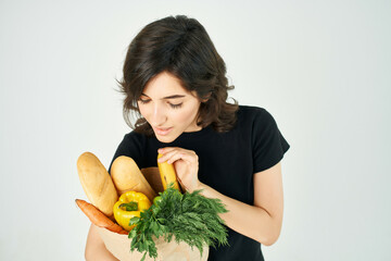 brunette with a package of groceries homework healthy food supermarket