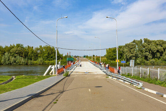 Bobrenevsky floating bridge over the Moskva river on a sunny summer day. Kolomna, Russia