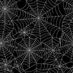 Halloween spider web seamless pattern. Black hand-drawn cobwebs crossing on white background. Repeating backdrop for textile, clothes, bedding, wrapping paper, wallpaper. Stock vector. - 454087150