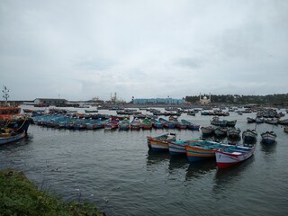 Fototapeta na wymiar fishing boats in vizhinjam Harbor, Thiruvananthapuram Kerala, seascape view