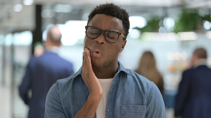 Portrait of African Man having Toothache, Cavity