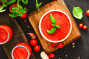 Tomato passata with basilium and garlic.