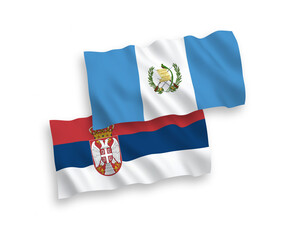 Fototapeta premium Flags of Republic of Guatemala and Serbia on a white background