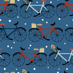 Vector seamless pattern with cute doodle bicycles on a blue background