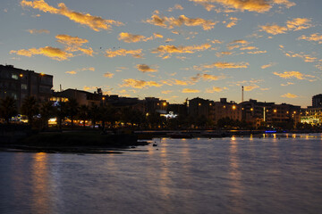 Fototapeta premium sea ​​and sky view of the city in the evening.