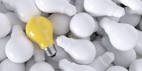 A good idea among bad ideas. A yellow lightbulb over several colorless lightbulbs. 