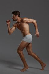 Obraz premium Young european man with naked sportive torso