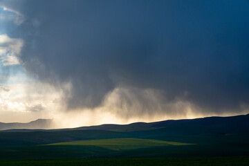 Fototapeta premium Storm clouds over farmlands. Near Caldon. Overberg. Western Cape. South Africa