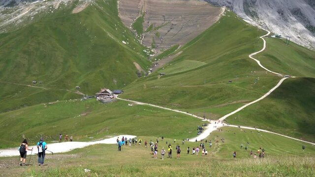 Europe, Italy , Trentino - Col Rodella, Val di Fassa August 2021- Tourists trekking and walking in Dolomites mountain 