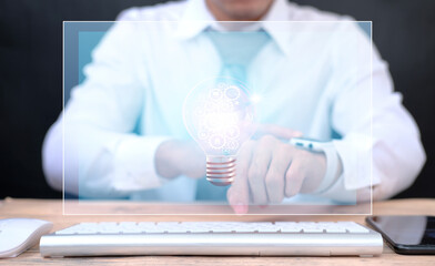 Idea innovation and inspiration concept. businessman holding illuminated light bulb, Hands holding light bulb for Concept new idea concept 