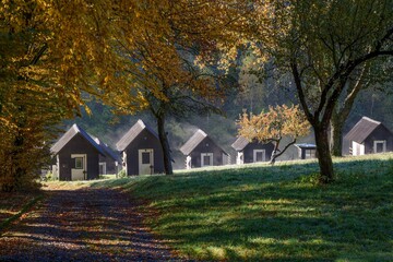 Evaporation of dew from the roofs of cottages. Czechia. Europe. 