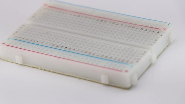 Breadboard which is an component to make electronic component to make circuits, Prototyping projects module, Full view of solderless breadboard