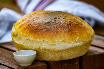 Fresh white wheat bread. Traditional Romanian bread from the oven. 