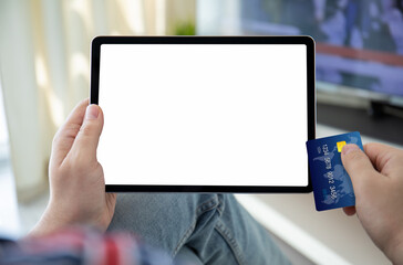 male hands holding computer tablet isolated screen plastic credit card