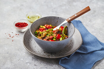 Quinoa with green beans, tomatoes, fried champignons, corn, red bell peppers, peas and soybeans. Healthy Vegetable Mix